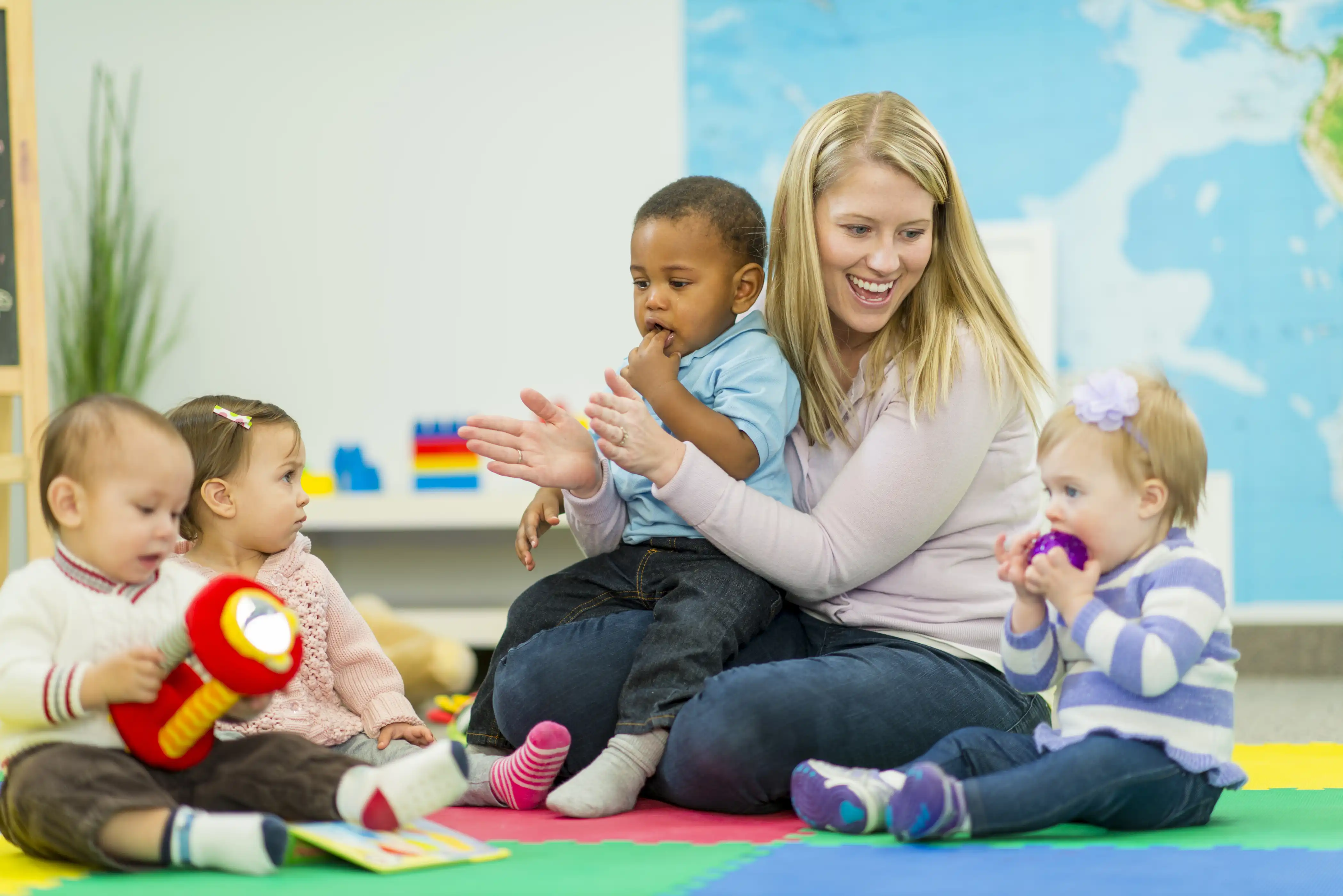 babies and woman clapping.
